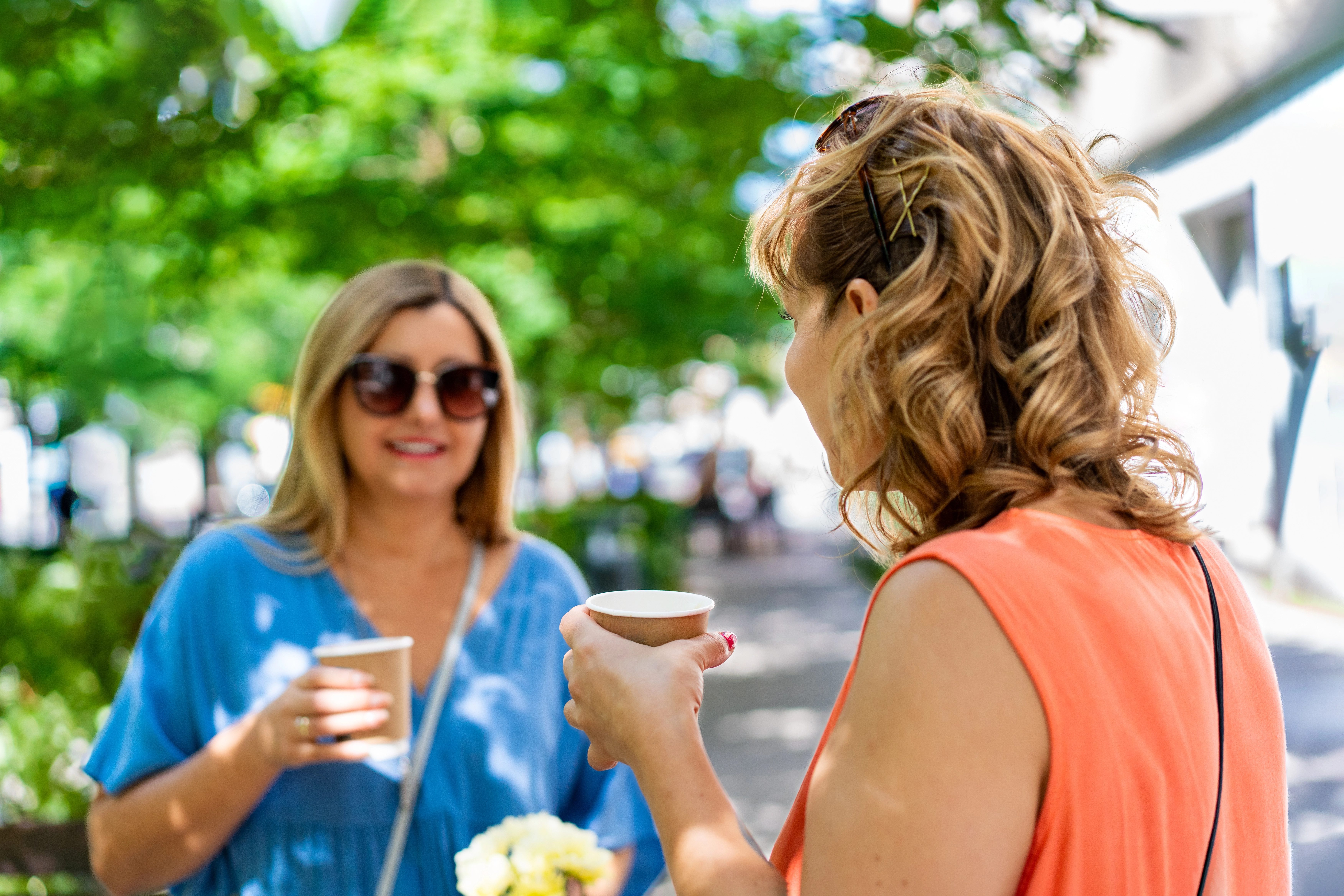 Women having coffee in the park.
